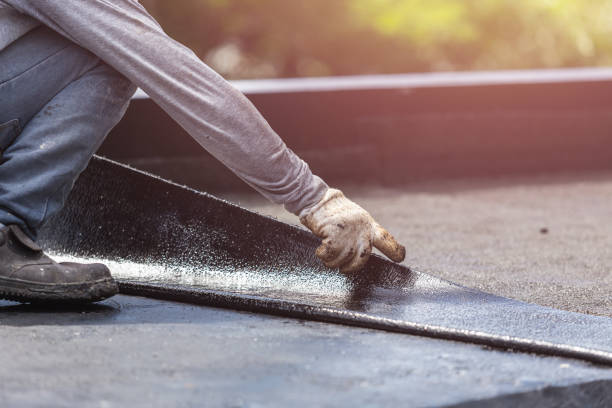 Professional Exterior Waterproofing technician working in Bowling Green, IN